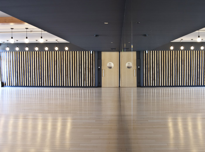 Yyoga North Shore Elements yoga empty studio architecture space with stylized mirror image