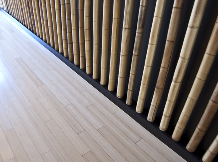 Yyoga North Shore Elements yoga studio flooring detail and bamboo wall interior design